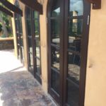 Using 2x4 compact design to hold plywood for hurricane protection 2