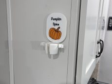 ‎multiple attachment coffee frother stand only wall mount pumpkin spice motif showing without frother