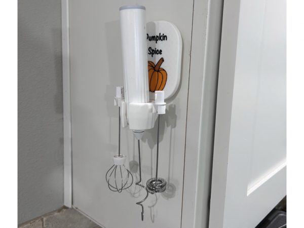 ‎Coffee Bar Accessory - multiple attachment milk frother stand only wall mount pumpkin spice motif showing in use