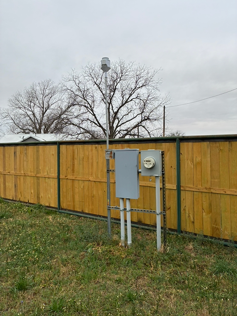 rain gauge - deployed on 10ft pole - but in PROTOTYPE COLOR - view 1