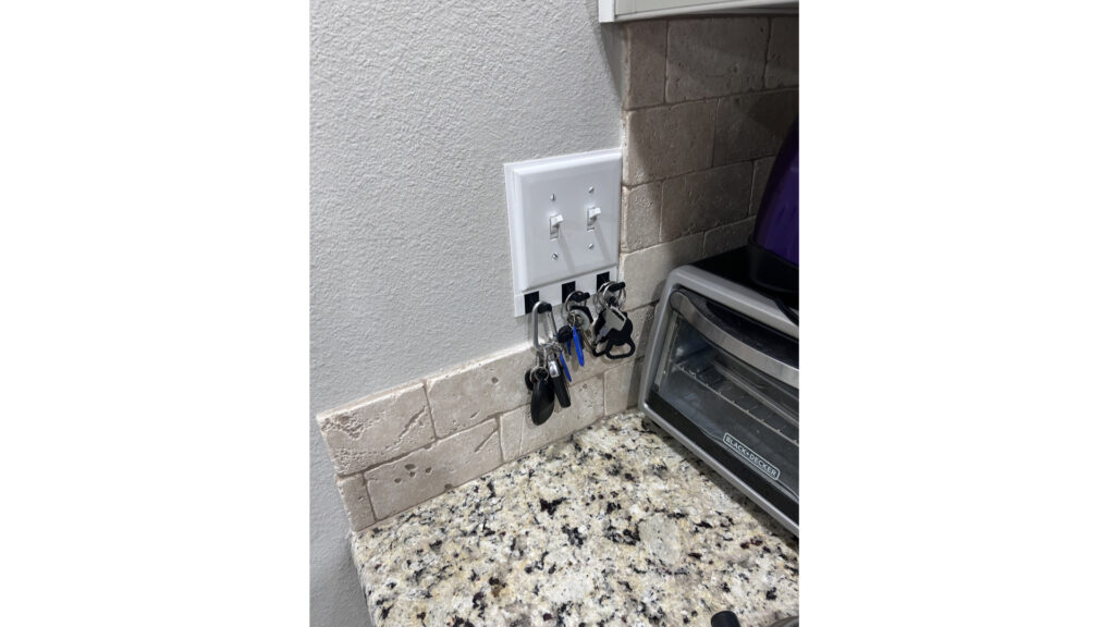 key holder for wall mount under light switch cover - 2 gang - installed in use